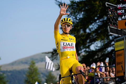 Slovenia's Tadej Pogacar celebrates his fifth stage victory